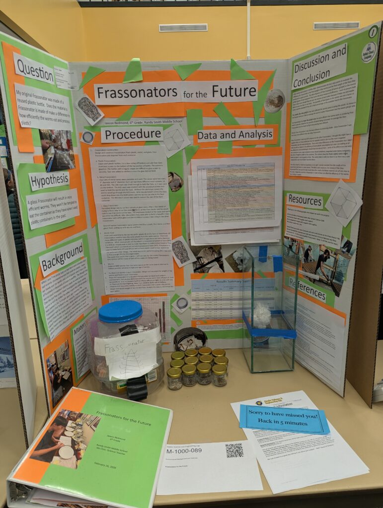 A photo of a green and orange-colored science fair poster titled "Frassonators for the Future" by Jaxson Redmond.